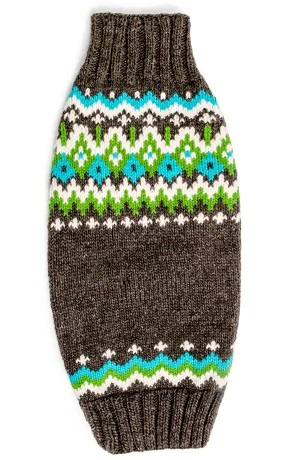 Knitted dog sweater with a colorful pattern on a white background